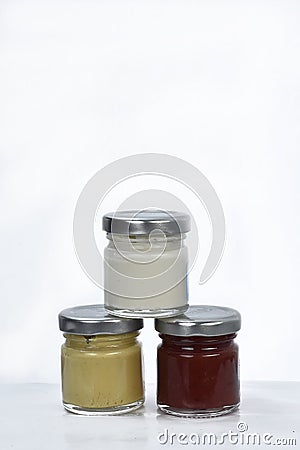 pots with sauce mayonnaise mustard ketchup spices for cooking Stock Photo