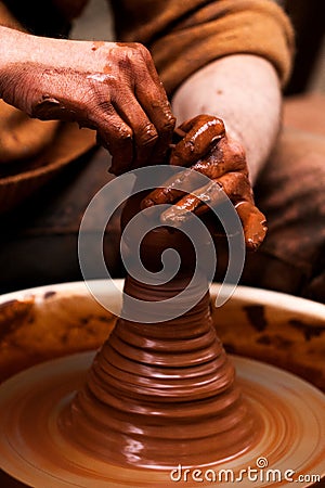 Potter hands jug Stock Photo