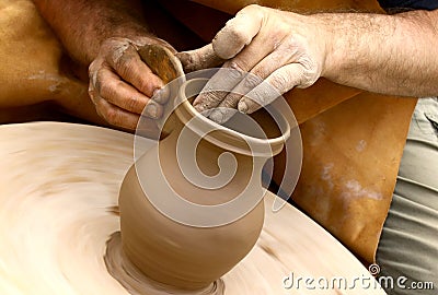 Potter making clay jug Stock Photo
