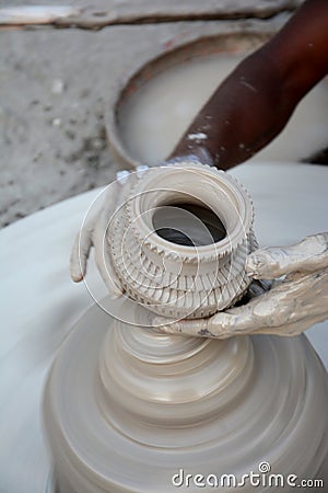 Potter making diyas clay lamps before diwali festival Stock Photo