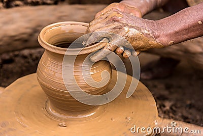 Potter making earthen pot Stock Photo