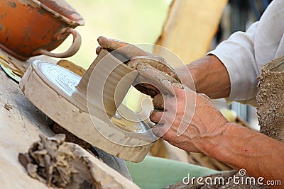 Potters hands Stock Photo