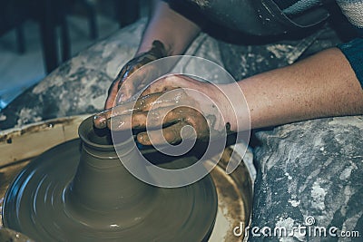 Pottery making, dirty hands in wet clay Stock Photo