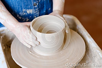 Pottery skill traditional child potter shape clay Stock Photo