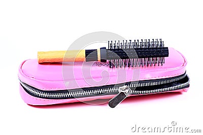 Pouch and hair roller brush Stock Photo