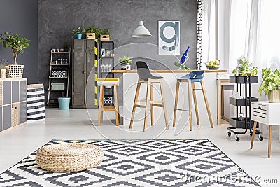 Pouf in spacious dining room Stock Photo