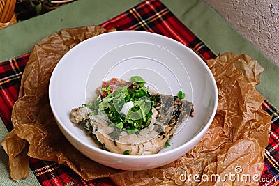 Poultry dish. Chahohbili chicken in a sauce of aromatic spices, onions, fresh parsley Stock Photo