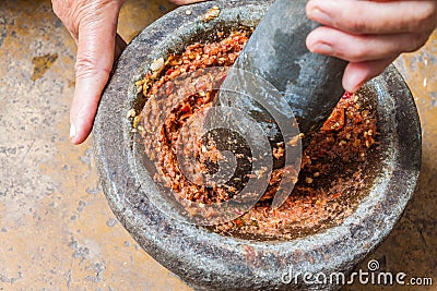 Pounding Thai chili sauce Stock Photo