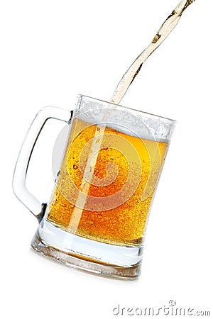 Pouring beer into mug Stock Photo