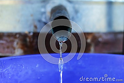 Pouring brandy in a bucket Stock Photo