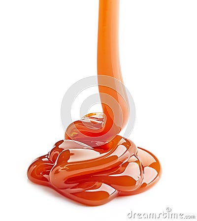 Pouring caramel sauce Stock Photo