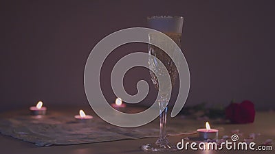 Pouring champagne in a glass in slow motion, romantic scene. Valentine's Day Pouring champagne in a glass in slow motion, romantic scene. Valentine's Day