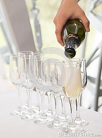 Pouring champagne, glasses. Alcohol, luxury event. Celebration Stock Photo