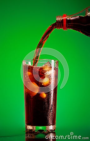 Pouring Cola Stock Photo