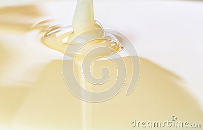 Pouring Condensed Milk II Stock Photo