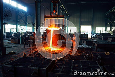 Pouring of liquid metal in open hearth workshop Stock Photo