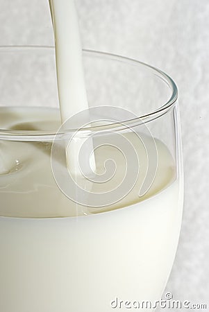 Pouring milk Stock Photo