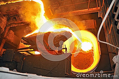Pouring molten steel Stock Photo