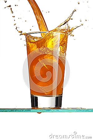 Pouring a orange beverage Stock Photo