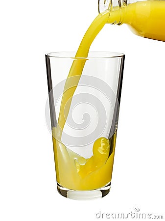 Pouring orange juice in a glass Stock Photo