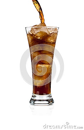 Pouring soda cola in a glass with ice on white Stock Photo