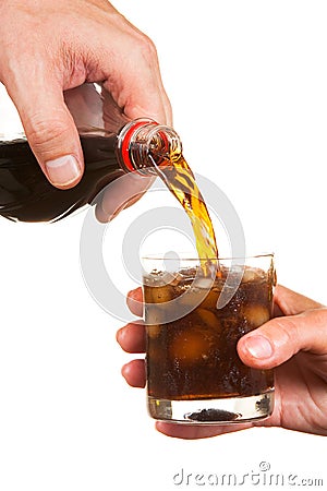 Pouring soda into a glass Stock Photo