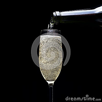 Pouring sparkling wine Stock Photo