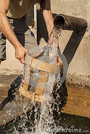 Pouring spring water Stock Photo