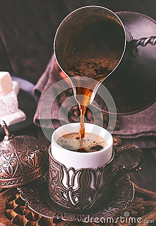 Pouring turkish coffee Stock Photo