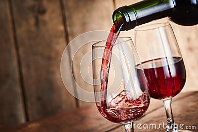 Pouring two glasses of fortified red port wine Stock Photo