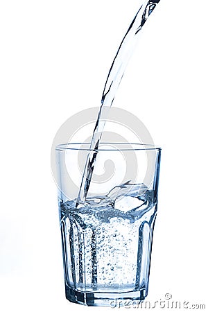 Pouring water into glass Stock Photo