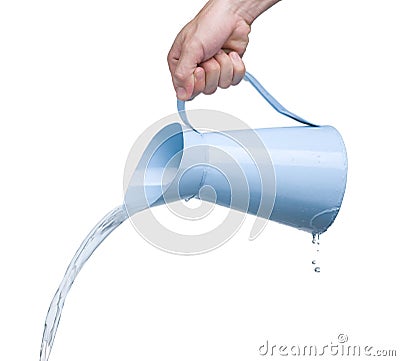 Pouring water from kettle Stock Photo