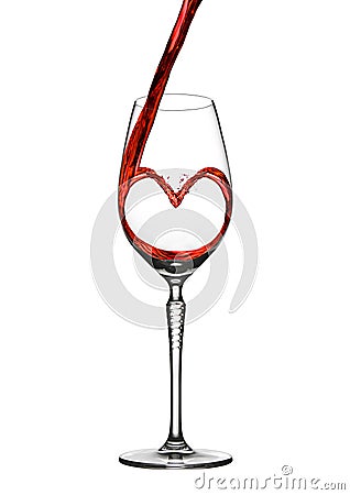 Pouring wine heart romantic shape to elegant glass Stock Photo