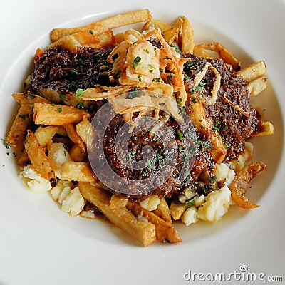 Poutine with braised ribs Stock Photo