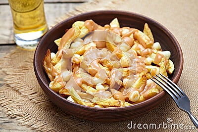 Poutine Quebec traditional meal with fries, curd cheese and gravy Stock Photo