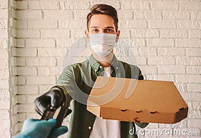 Man courier checkout customer and payment for delivery with credit card Stock Photo