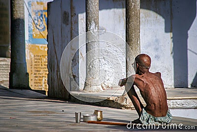 Poverty in india with old skinny man Editorial Stock Photo