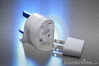 Power adapters between USA and Great Britain Stock Photo