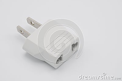 Power Adapters on White Background. Stock Photo