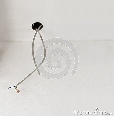 Power cables for the electrical installation in a dry construction ceiling from a new renovated house, copy space Stock Photo