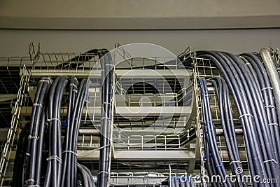 Power cables in the trays in the switchgear. Stock Photo