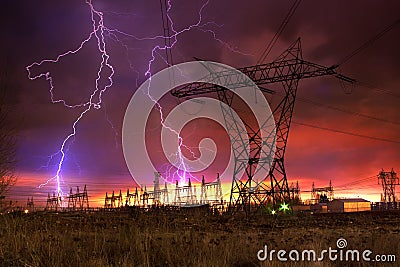 Power Distribution Station with Lightning Strike. Stock Photo