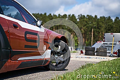 Power drifting car from side. Front door Editorial Stock Photo