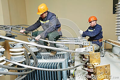 Power electrician lineman at work Stock Photo