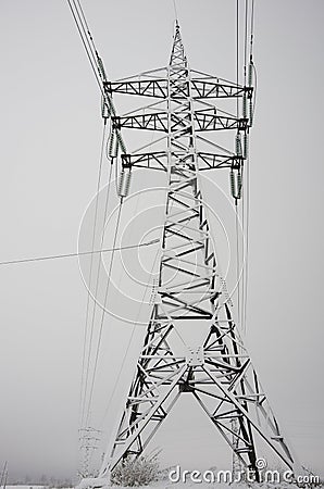 Power line column after a blizzard Stock Photo
