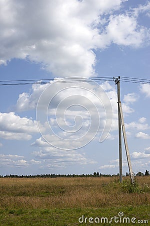 Power line under blue sky with clouds of white Stock Photo