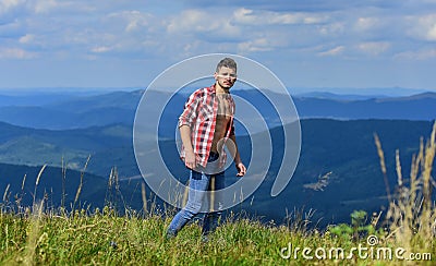 Power of nature. Man unbuttoned shirt stand top mountain landscape background. Strong hiker muscular torso. Athlete Stock Photo