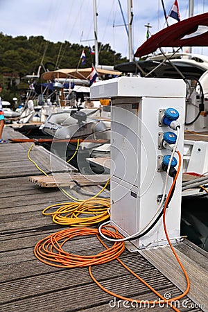 Power pedestal in a marina in Croatia Editorial Stock Photo