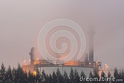 Power plant on sunrise sky. Chimney of thermal power plants. Stock Photo