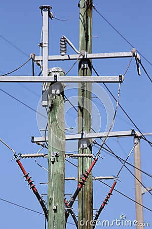 Power Pole Intersection on Blue Sky Stock Photo